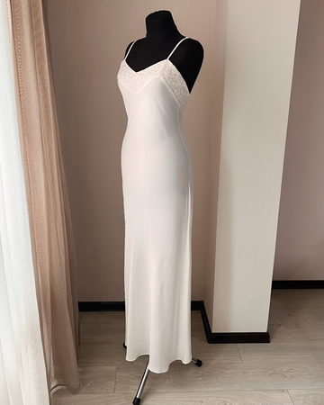 a dress on a mannequin in a room