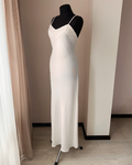 a dress on a mannequin in a room