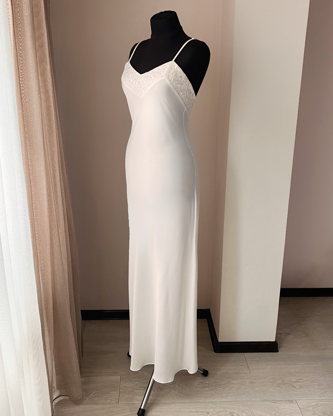 a dress on a mannequin in a room