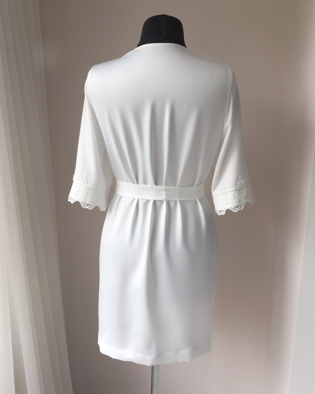 a dress on a mannequin in a room