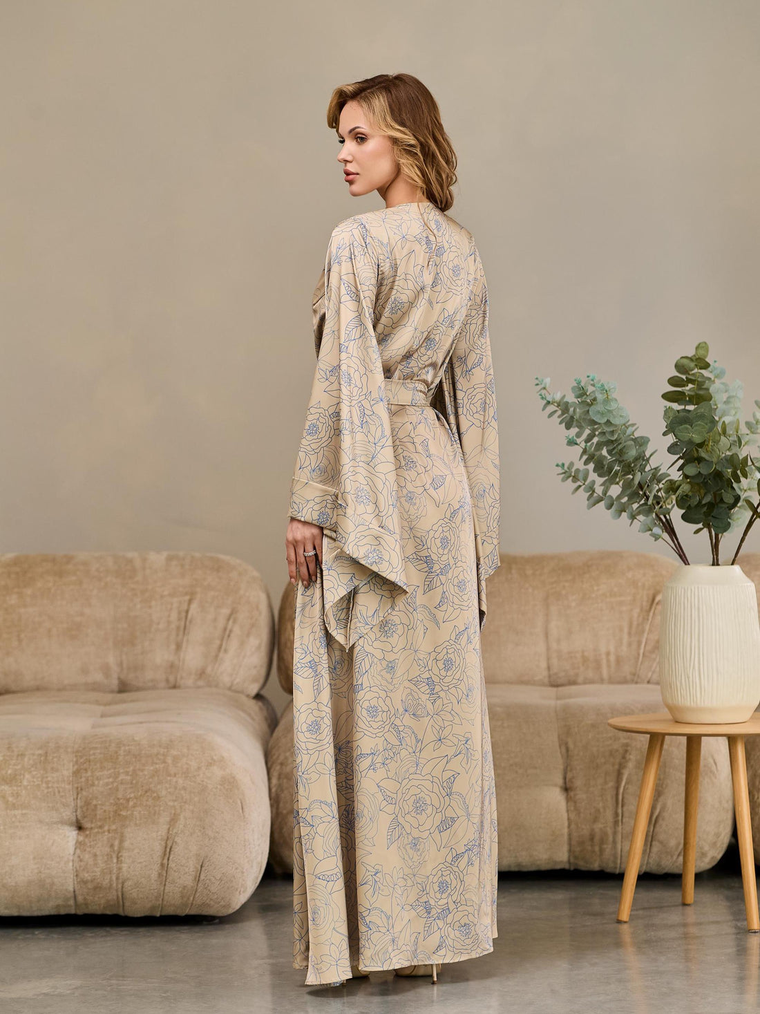 Beige floral silk satin kimono robe with blue botanical print and wide long sleeves – front view on model