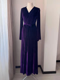 Velvet purple long robe tied at waist with matching belt, soft luxurious evening gown look.