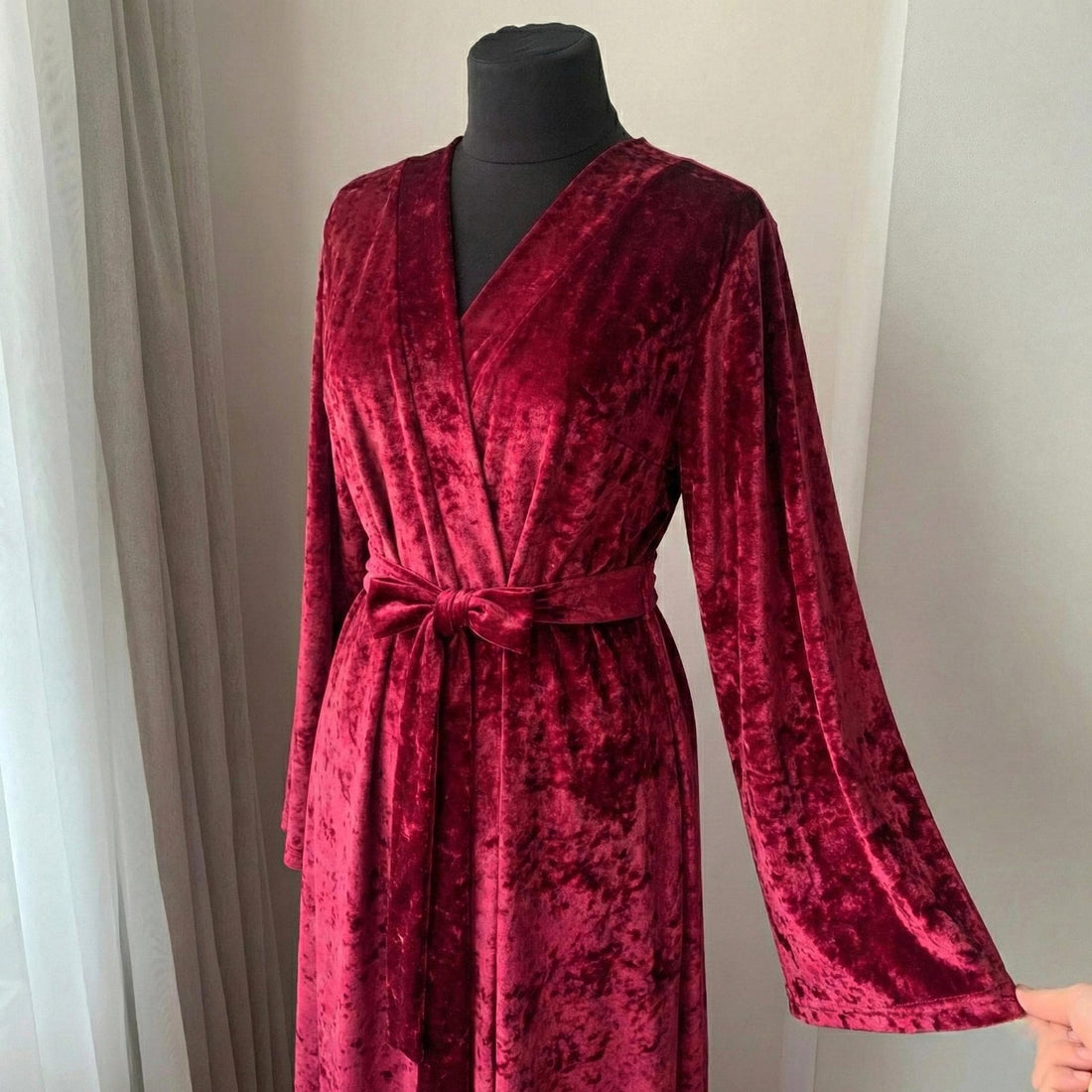 Crushed velvet burgundy robe with deep V neckline and wide tie belt