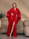 Red silk satin kimono robe, floor-length with wide 3/4 sleeves and tie belt – front view on model