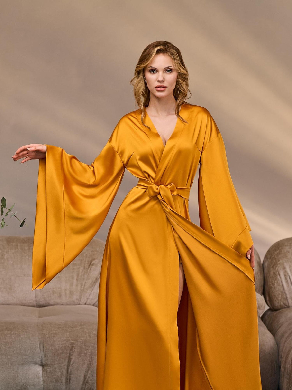 Gold silk satin kimono robe with wide 3/4 sleeves and tie belt – front view on model