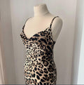 Handmade leopard satin maxi nightgown showing its flowing animal print fabric