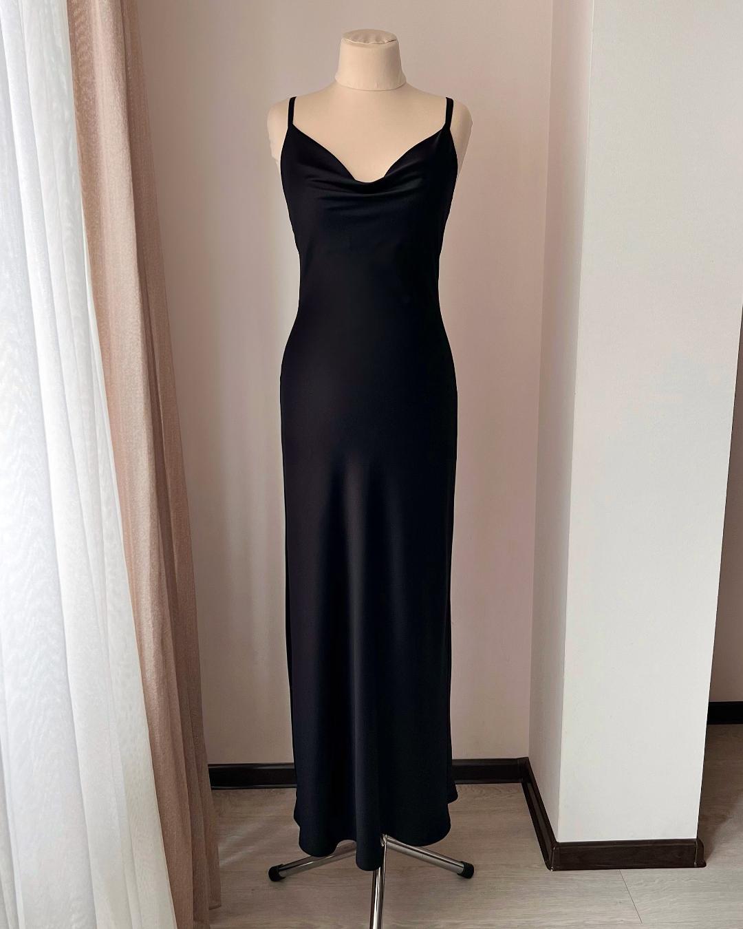Black satin floor-length nightgown with draped cowl neckline and adjustable straps