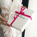 BellaDonnaUa gift box with pink ribbon – packaging for the black satin maxi slip dress