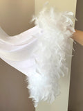 White velvet feather robe worn by model, front view