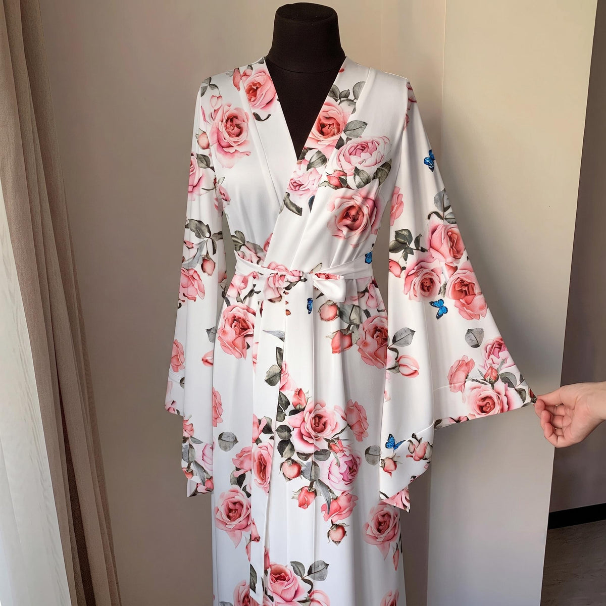 Handmade ivory floral bridal robe with flowing hem and matching waist belt