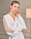Detailed close-up of the bridal robe’s sleeve, highlighting the intricate beaded Chantilly lace with a floral pattern. The sleeve features a unique split design, creating a soft drape, while pearl buttons at the cuff add a refined vintage charm. The combination of satin and lace creates a delicate, romantic aesthetic.
