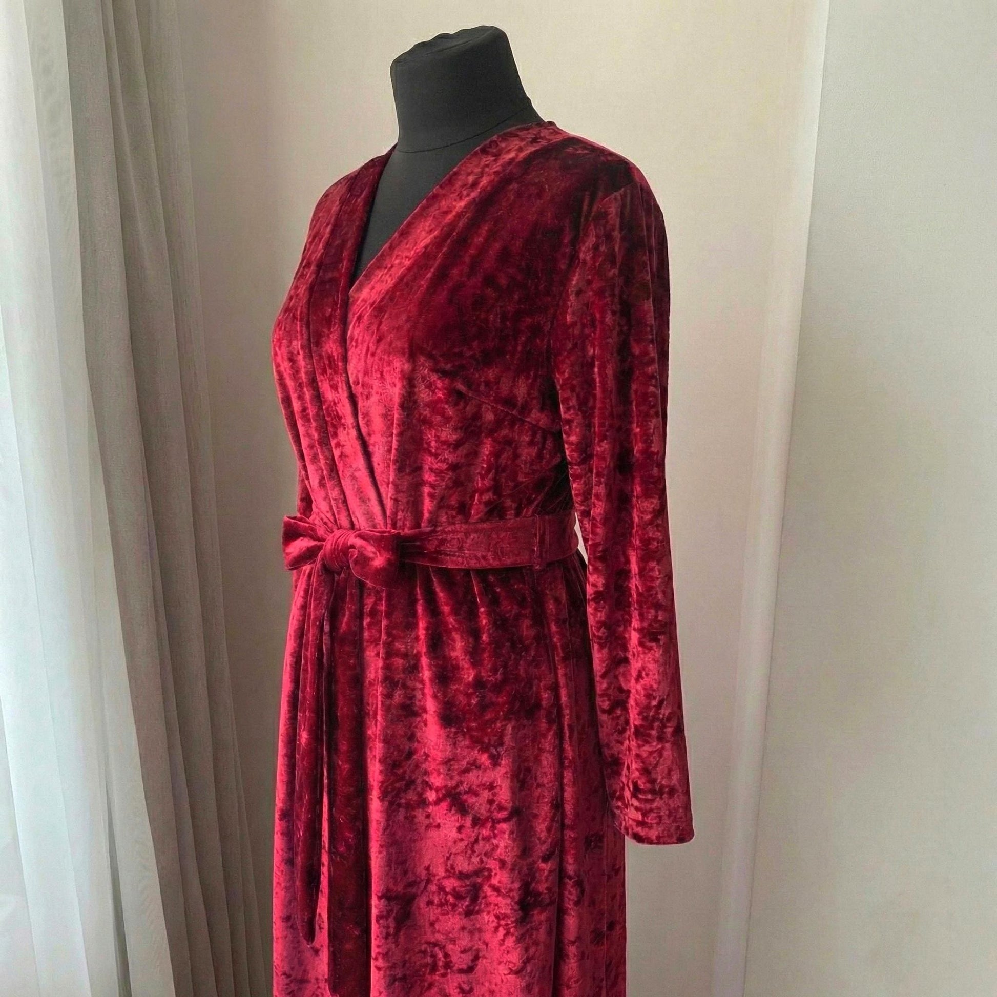 Crushed velvet burgundy robe detail of deep V neckline