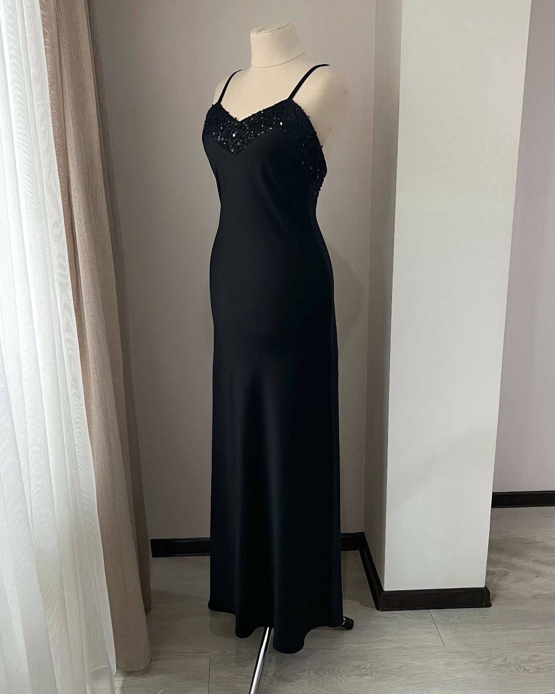 a dress on a mannequin in a room