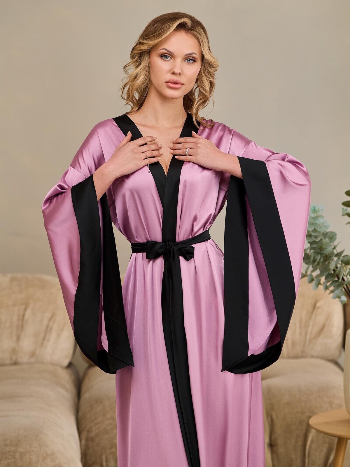 Purple satin long bridal robe with contrasting black trim and flowing hem