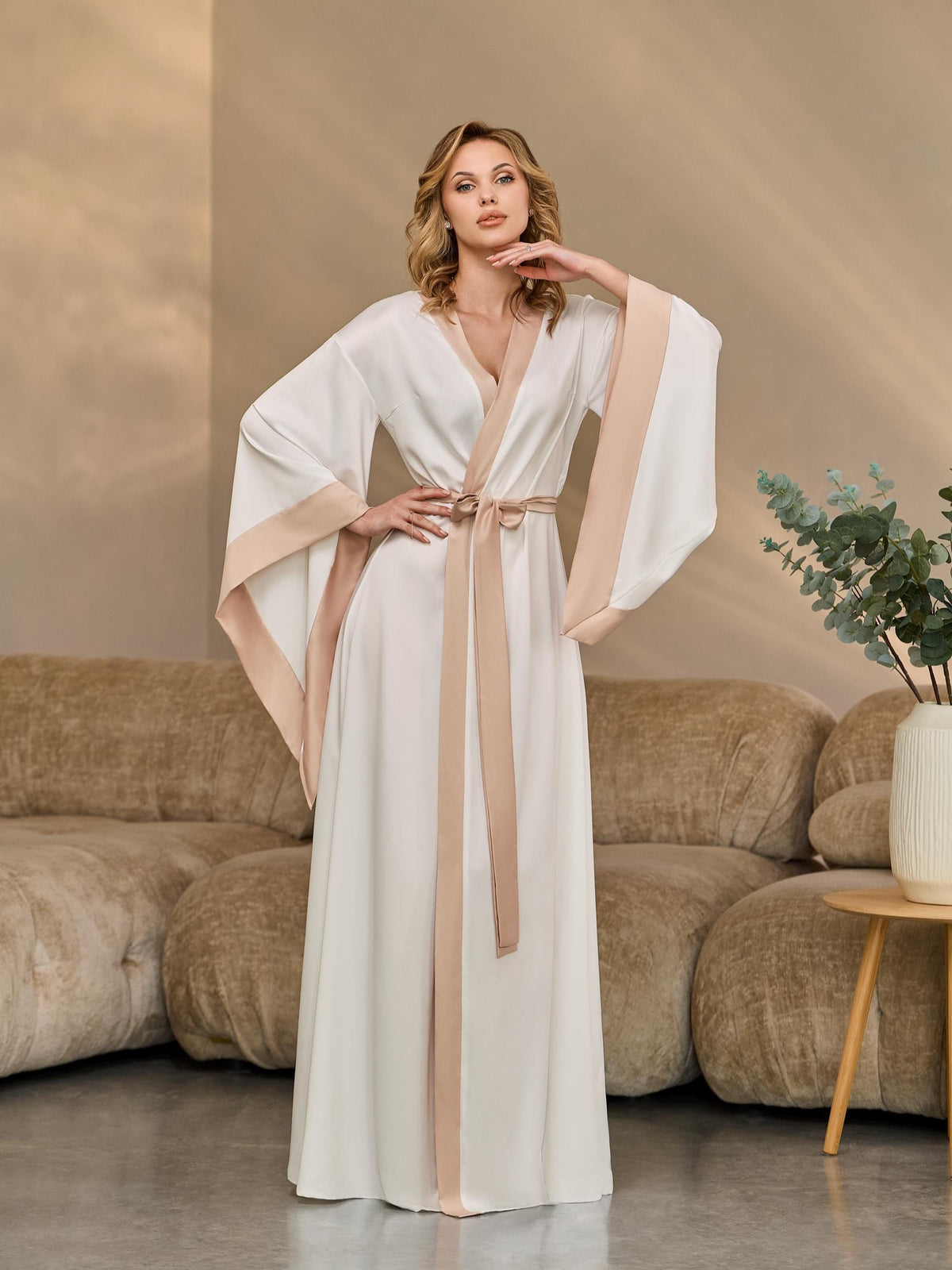 Bride in long ivory kimono robe with tie belt, front view