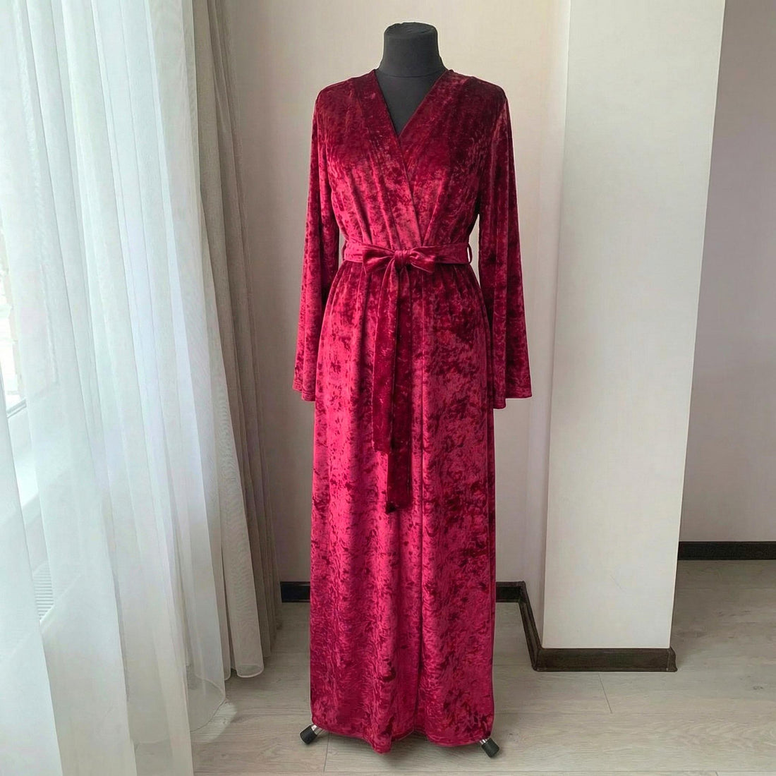 Crushed velvet burgundy robe with deep V neckline and wide tie belt