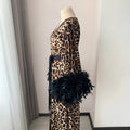 Animal print satin dressing gown with black feather details on the sleeve cuffs