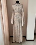 a robe on a mannequin in a room