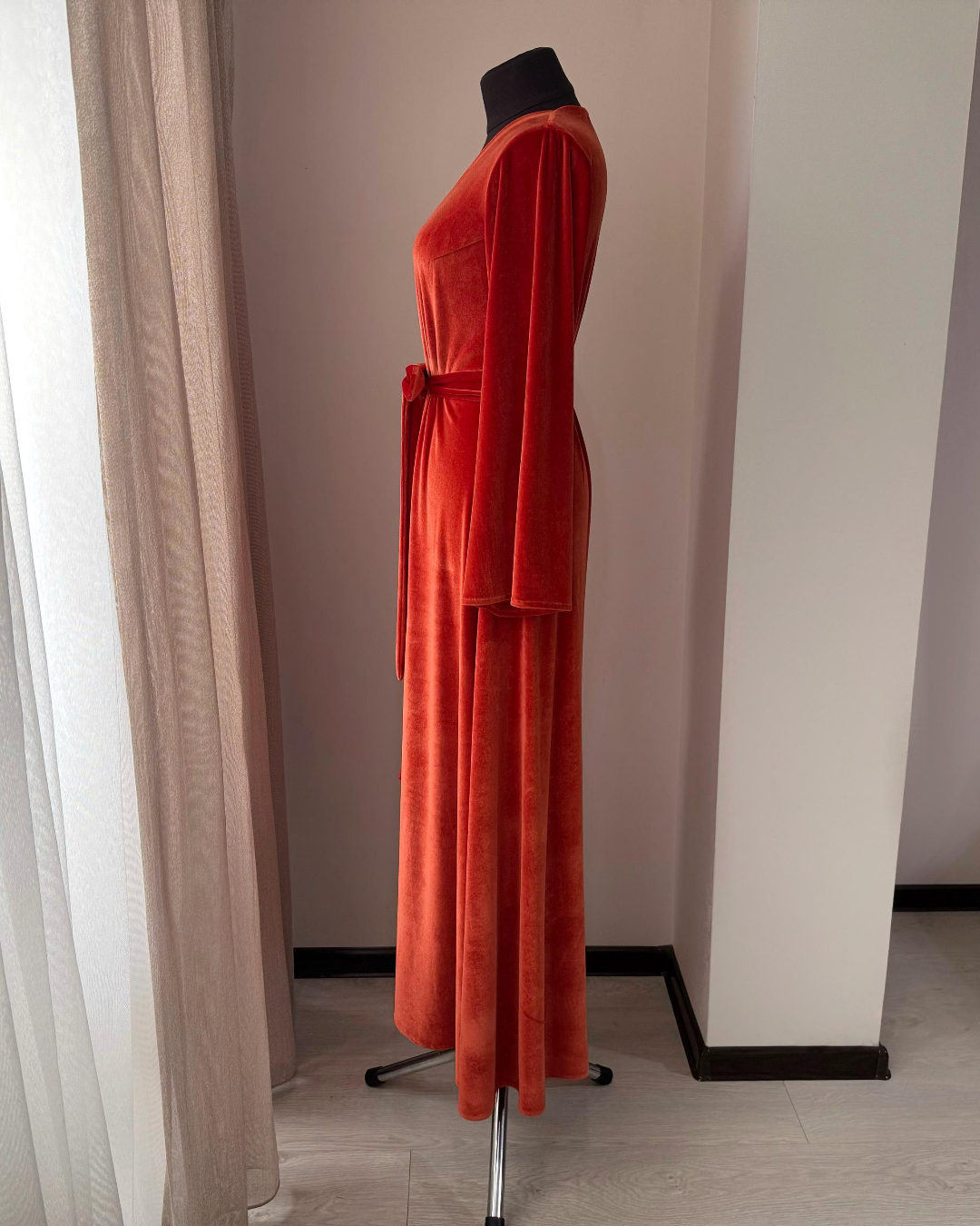 a dress on a mannequin in a room