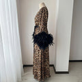 Long leopard satin robe with wide sleeves and statement black feather cuffs