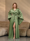 Green silk kimono robe for women, floor-length with dramatic 3/4 sleeves – front view on model