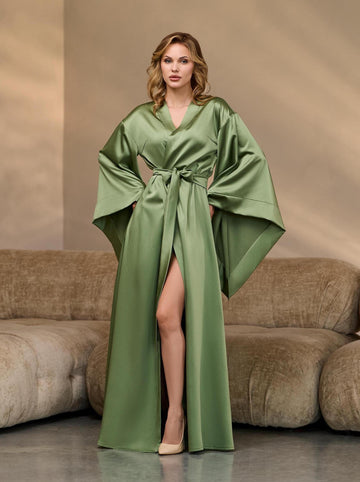 Green silk kimono robe for women, floor-length with dramatic 3/4 sleeves – front view on model