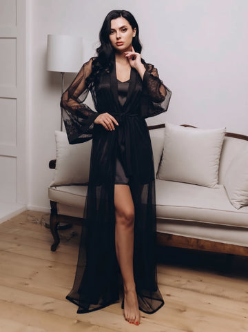 Black sheer lace boudoir robe made with lightweight tulle, wide long sleeves and a flowing floor-length silhouette.