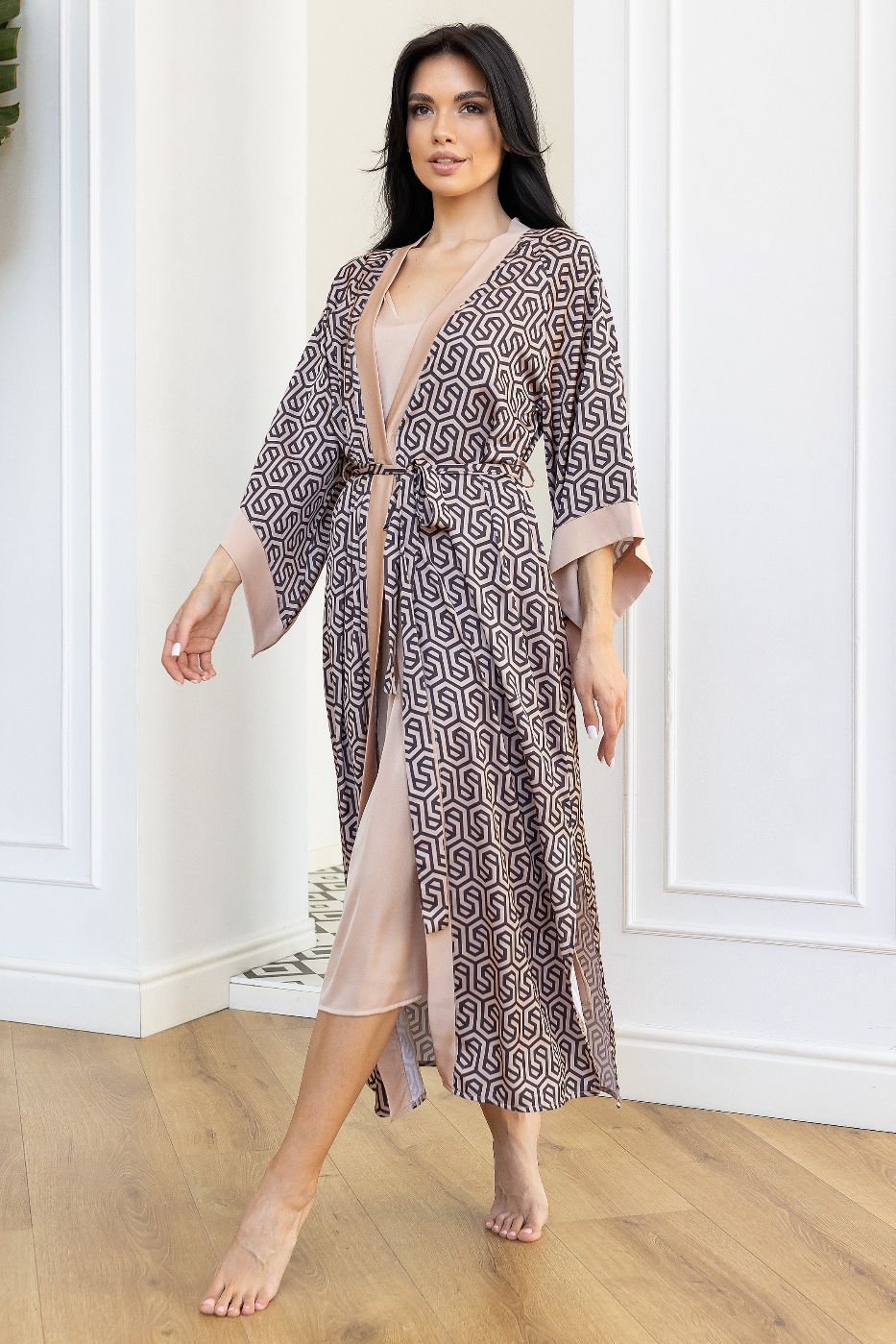 Elegant women's robe with geometric pattern and soft blush lining.