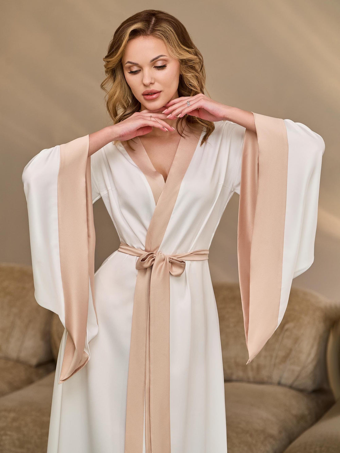 Ivory silk satin bridal kimono robe with cappuccino trim, front view with wide sleeves spread