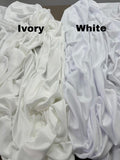 two white sheets with the words ivory and white on them