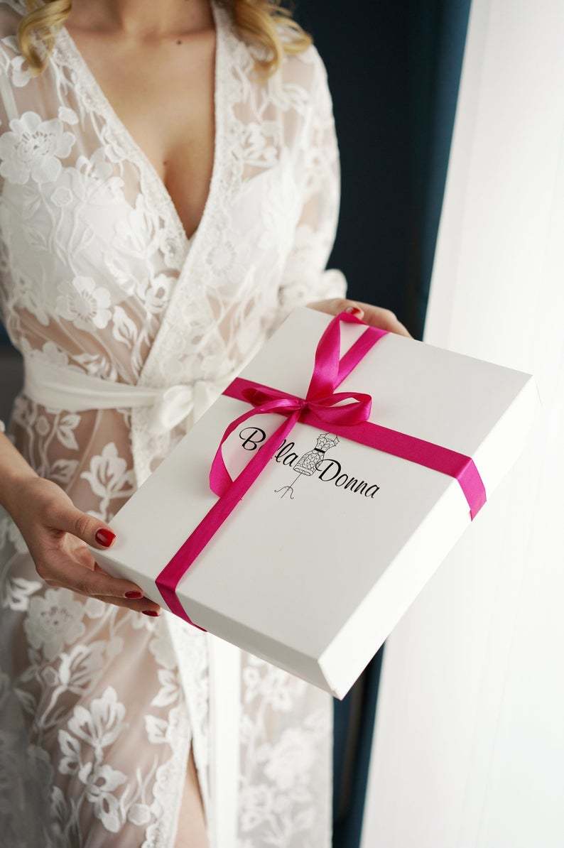 White velvet feather robe, full-length view showing wide sleeves