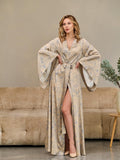 Beige floral silk satin kimono robe with blue botanical print and wide long sleeves – front view on model