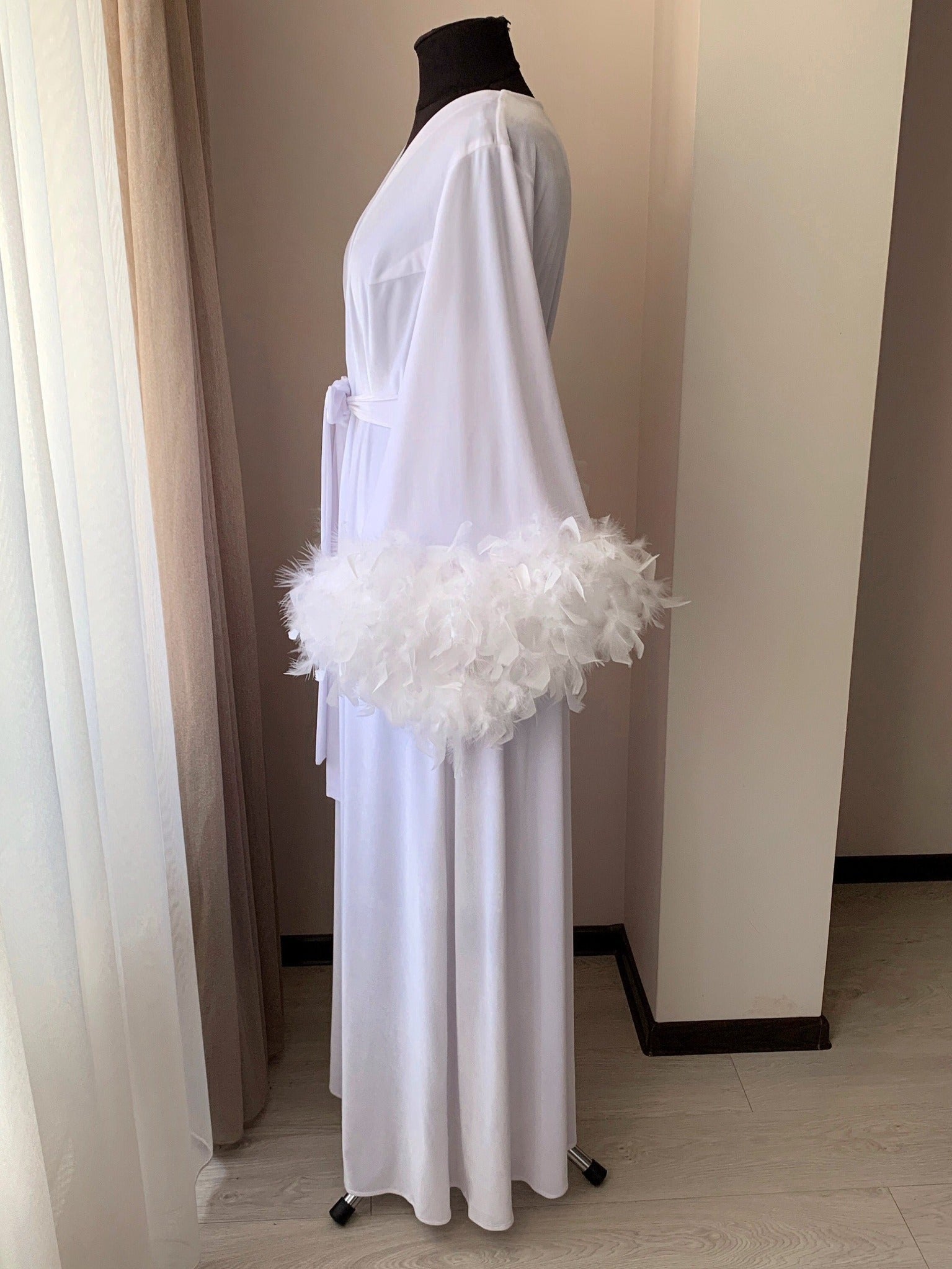 White velvet feather robe styled for a bridal morning