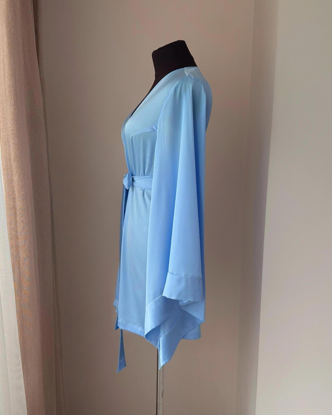 a dress on a mannequin in a room