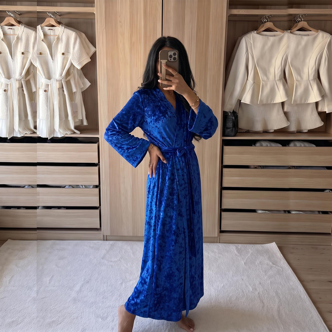 Royal blue crushed velvet robe, floor-length with tie belt, worn by model – front view