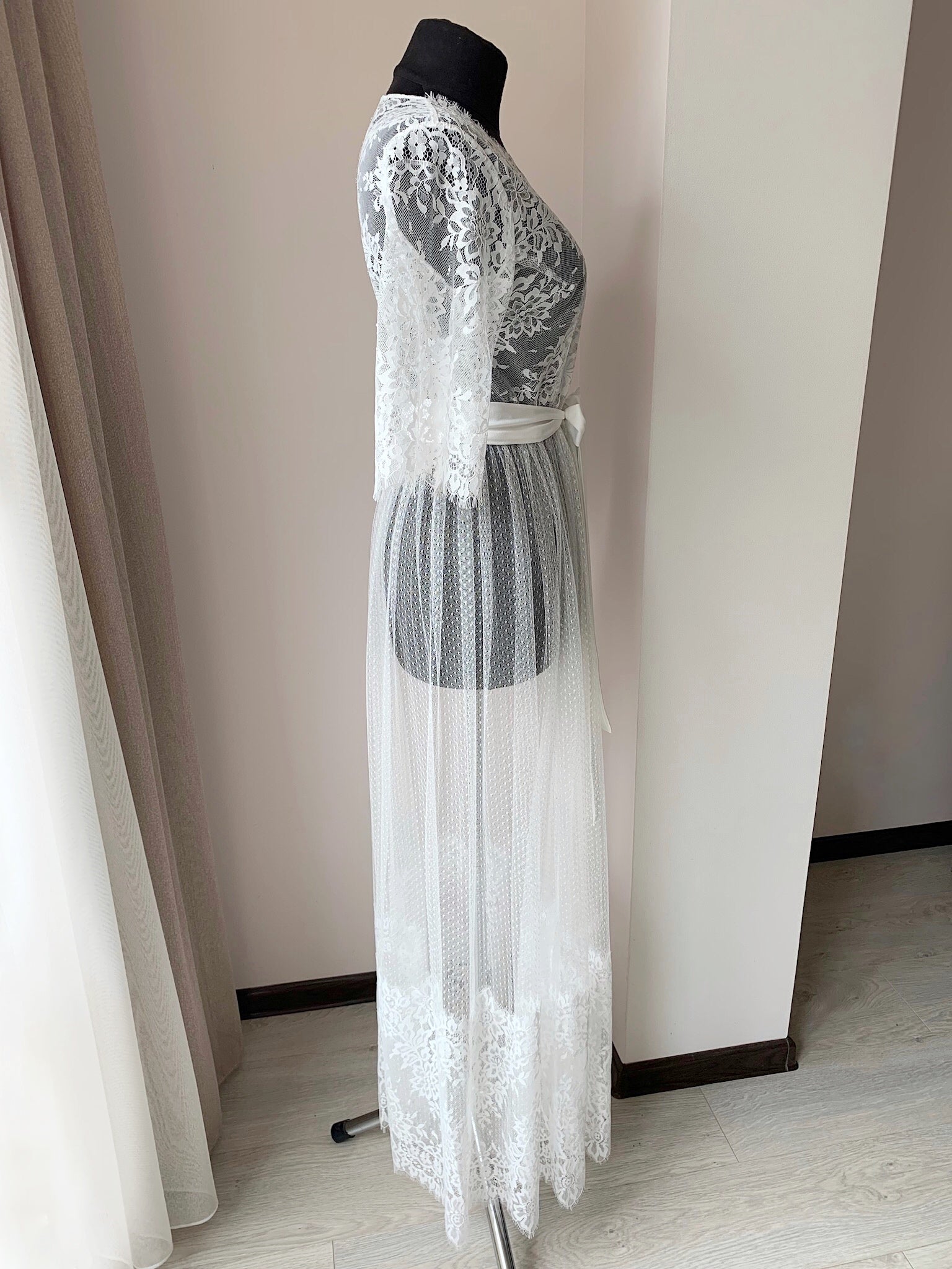 a dress on a mannequin in a room