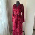 Crushed velvet burgundy robe styled as elegant loungewear at home