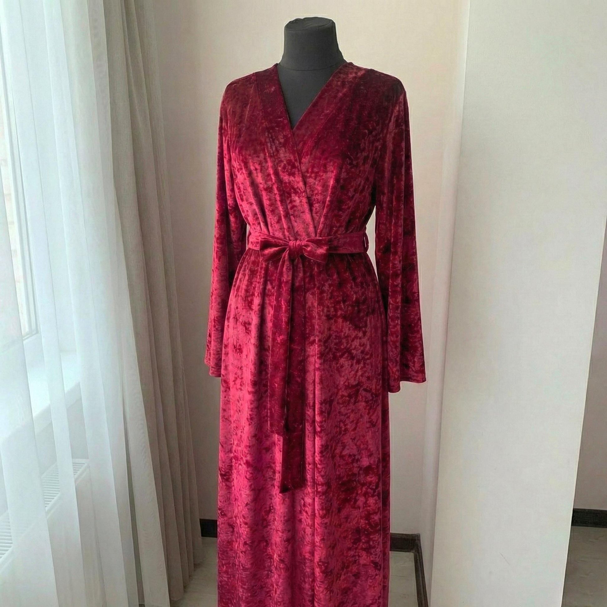Crushed velvet burgundy robe styled as elegant loungewear at home