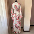 Floor length floral satin robe for wedding morning with blush roses on ivory