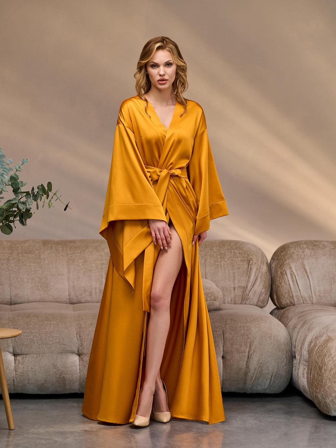 Gold silk satin kimono robe with wide 3/4 sleeves and tie belt – front view on model