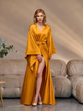 Long golden mustard satin kimono robe worn open at the front – full length