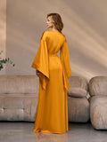 Back view of a golden silk satin kimono robe with belted waist