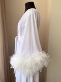 White velvet feather robe worn by model, back view