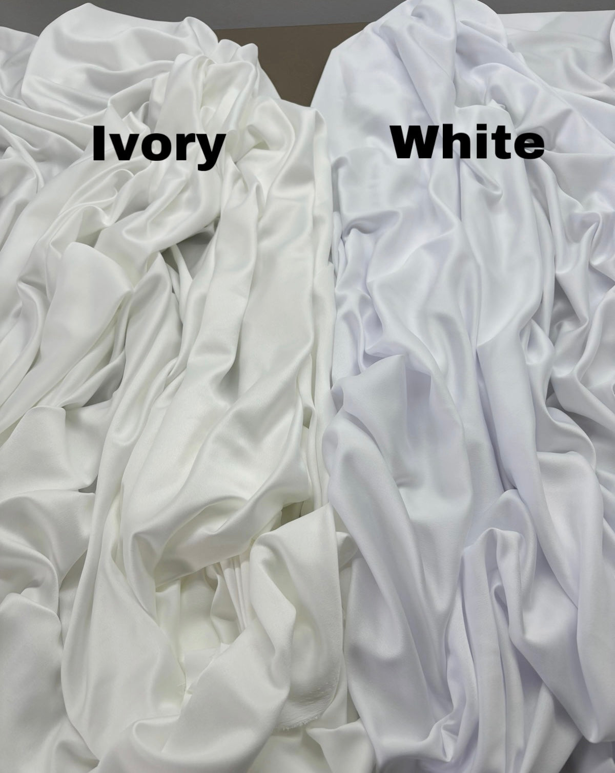 a bed with a white comforter and a white sheet