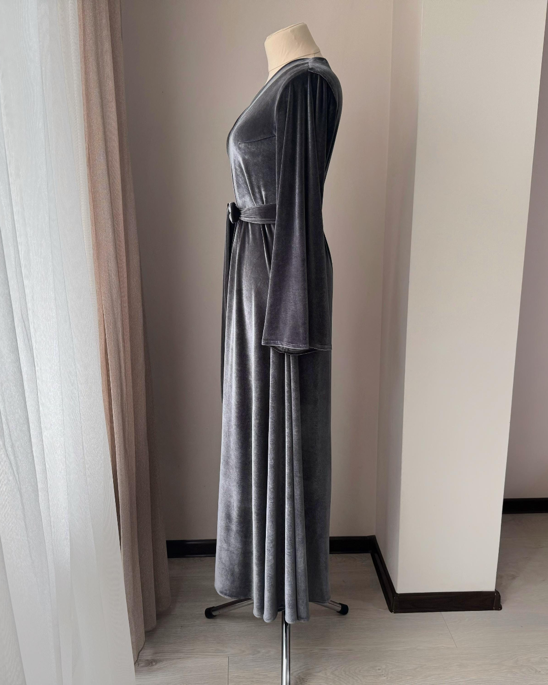 a dress on a mannequin in a room