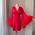 Short red satin robe with feather trim sleeves, bridal getting ready outfit