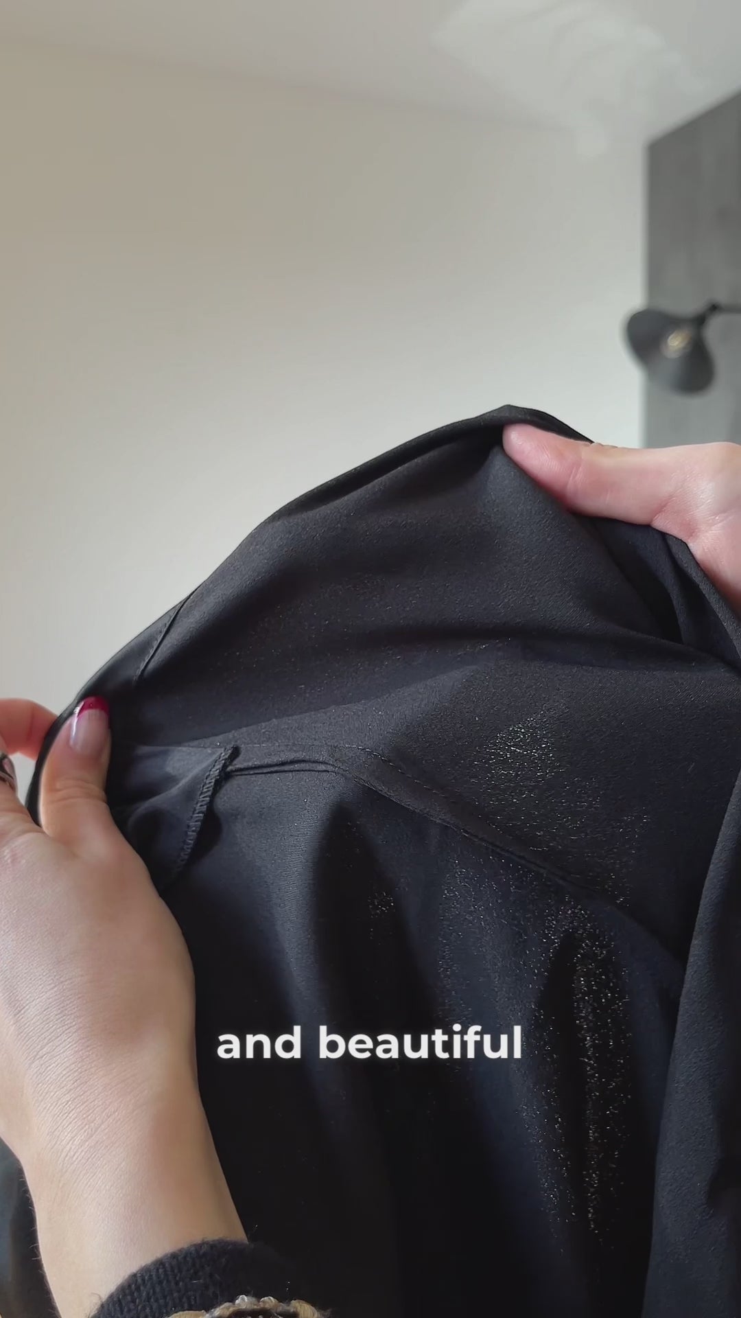 Video showcasing floor-length black satin nightgown with cowl neckline