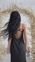 Video of long black lace nightgown with open back in motion