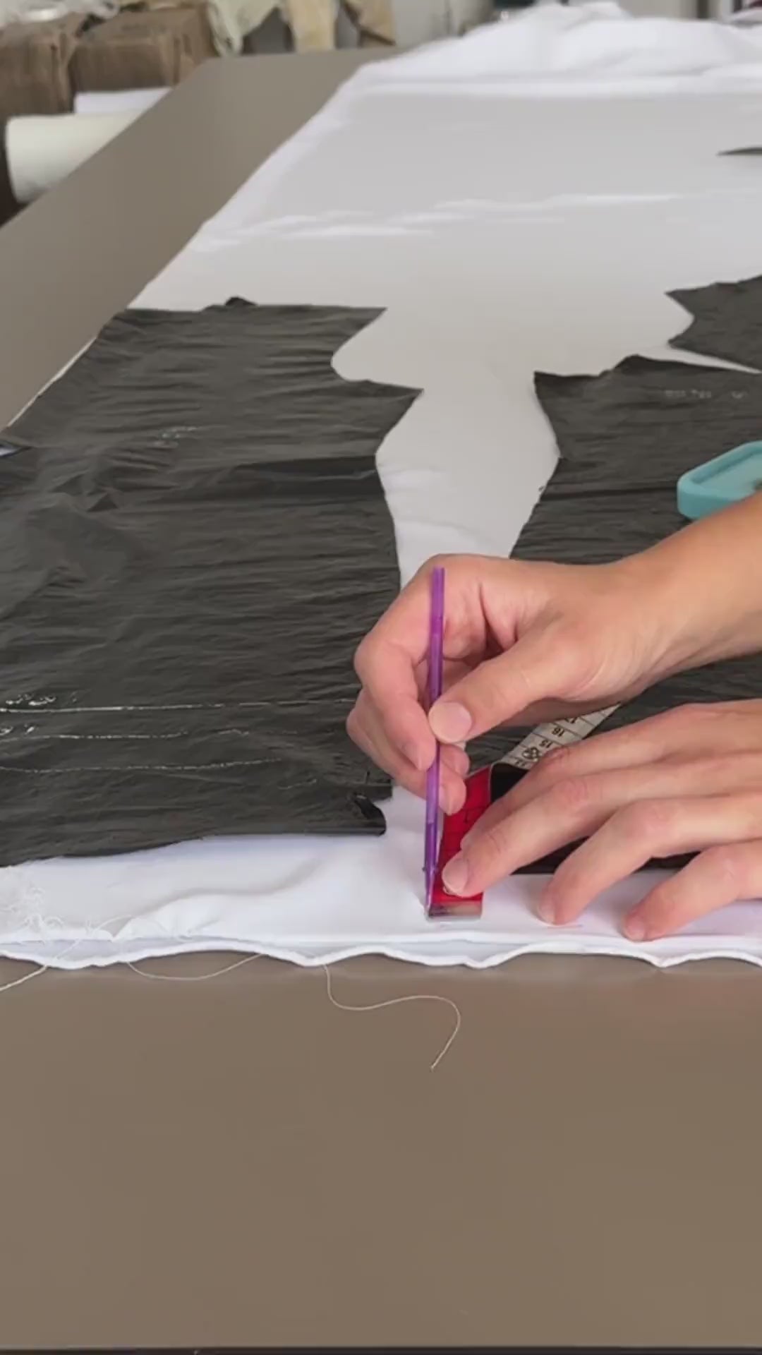 Video of satin fabric being cut for a handmade BellaDonnaUa slip dress