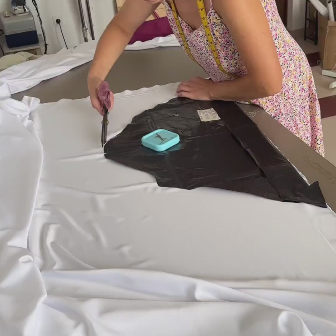 Handmade in Ukraine: cutting silk satin fabric in the BellaDonnaUa workshop